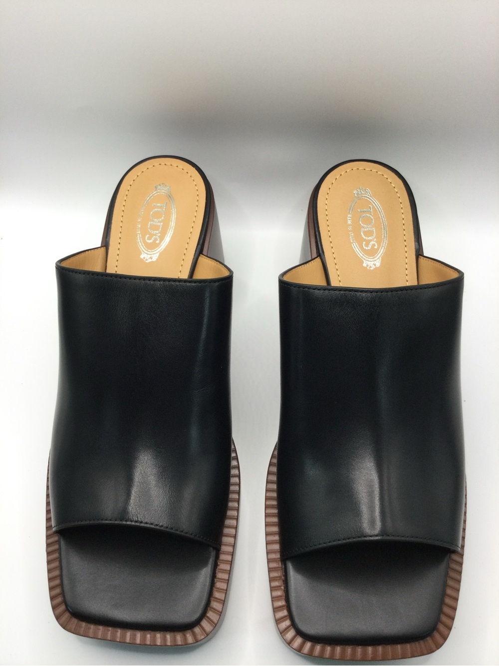 Tod's Black Leather Open-Back Mules with Brown Ribbed Trim